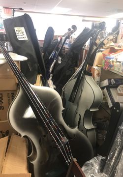 HAND MADE DOUBLE BASS DE DON CORTEZ STARTING AT $700.00. WE ALSO CARRY DOUBLE BASS/ELECTRIC.