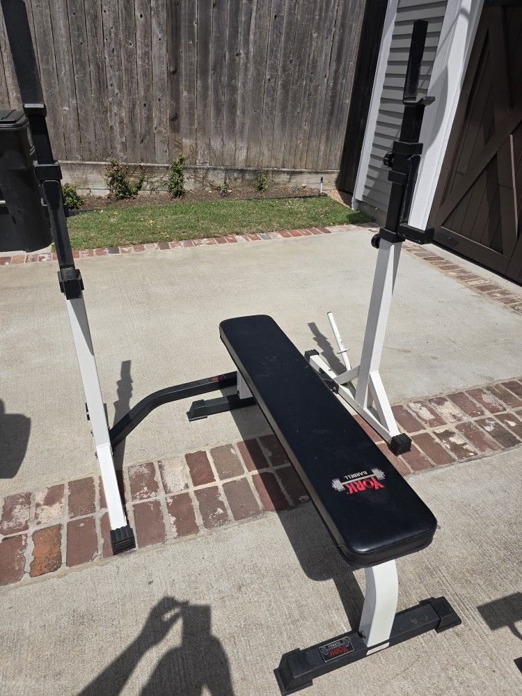 YORK BARBELL BENCH AND RACK VERY SOLD RACK AND BENCH EVER MADE