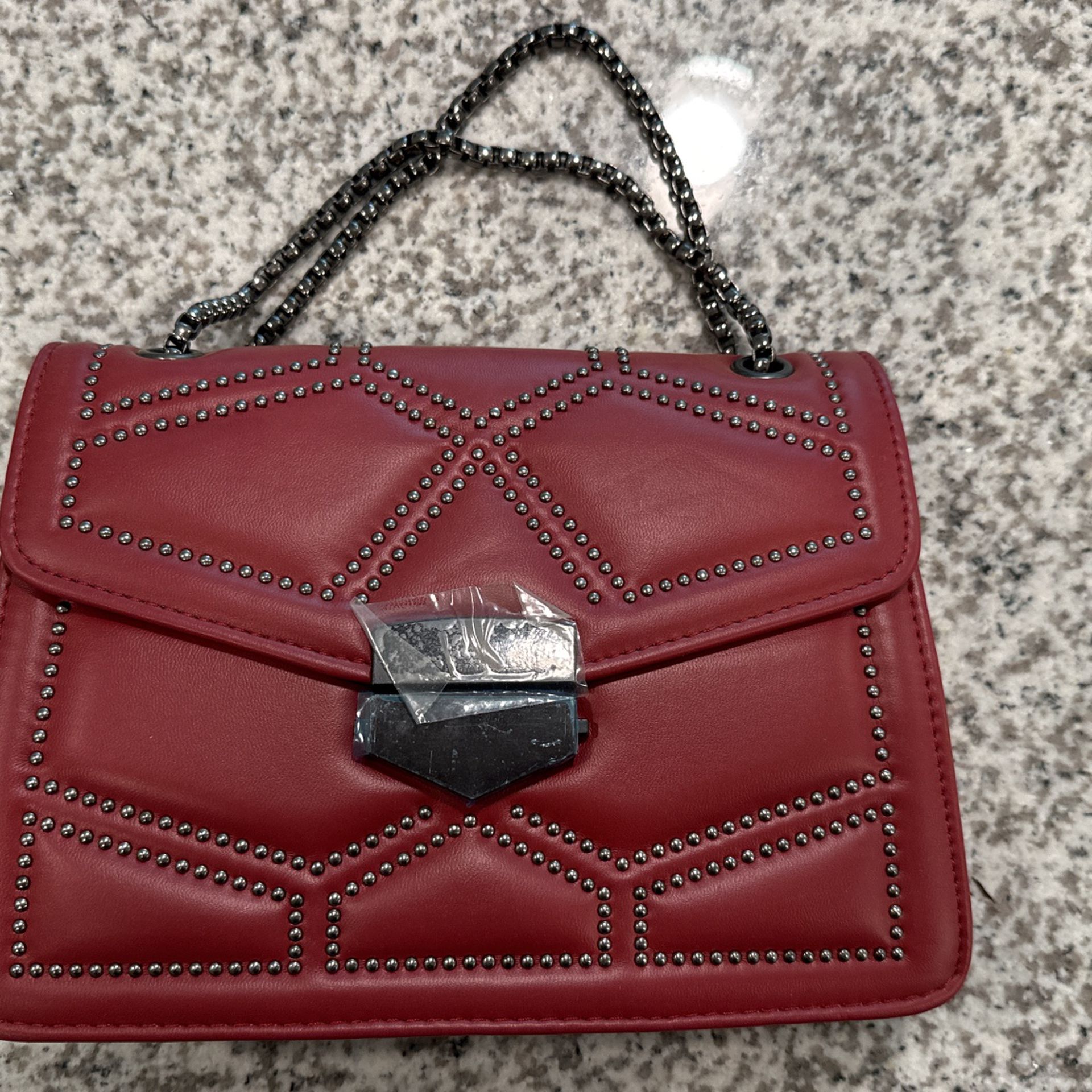 Burgundy Purse With Black Chain Link Straps 