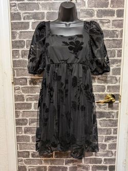 Size L black mini dress with floral mesh