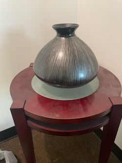 Beautiful twin grayish colored vases sold as a set