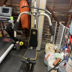 Gold’s Weight Stack Machine With Upper and Lower Pulleys. 