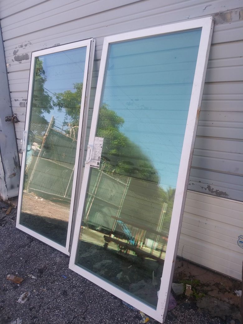2 good condition tempered glass 36x78 sliding glass door panels for ...