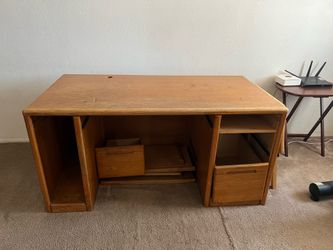 Free Executive solid oak desk. 60 wide x 30 1/2 deep x 29 1/2 tall. Needs sanded down & stained