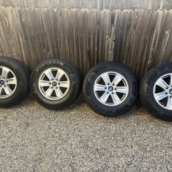 Like new Ford tires and rims