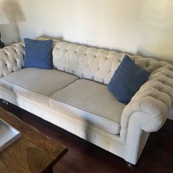 Custom-built linen tufted sofa