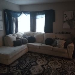 Tan Couches  With Accent Pillows