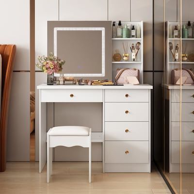 39.4-in White Makeup Vanity This 39.4-inch wide vanity set not only has an attractive look, it also has excellent storage to ensure you're