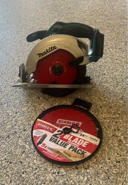 Makita LXT handheld circular saw with 2 new Diablo blades