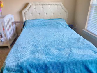 Beige Queen size bed with storage under