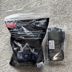 New, never used 3M Reusable Respirator with Speaking Diaphragm and 3M P100 Respirator Cartridge/Filter, Secure Click D80921
