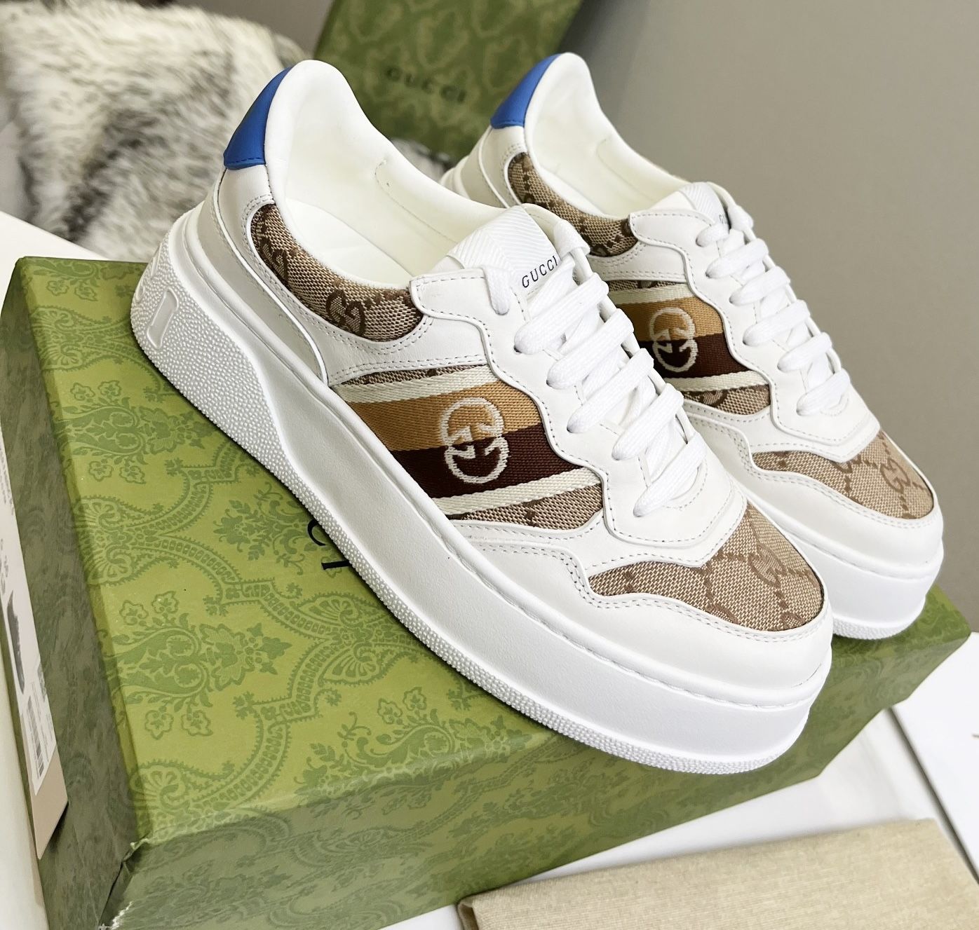 WOMEN'S GUCCI EMBOSSED SNEAKER