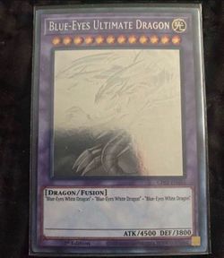 NM-Blue-Eyes Ultimate Dragon (Ghost Rare)