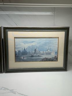 Two matching pictures with cloth mats