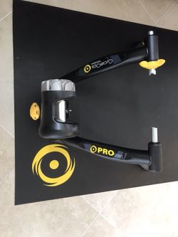 Cycleops pro fluid cycling trainer, mat and 2 climbing blocks. Used less than an hour
