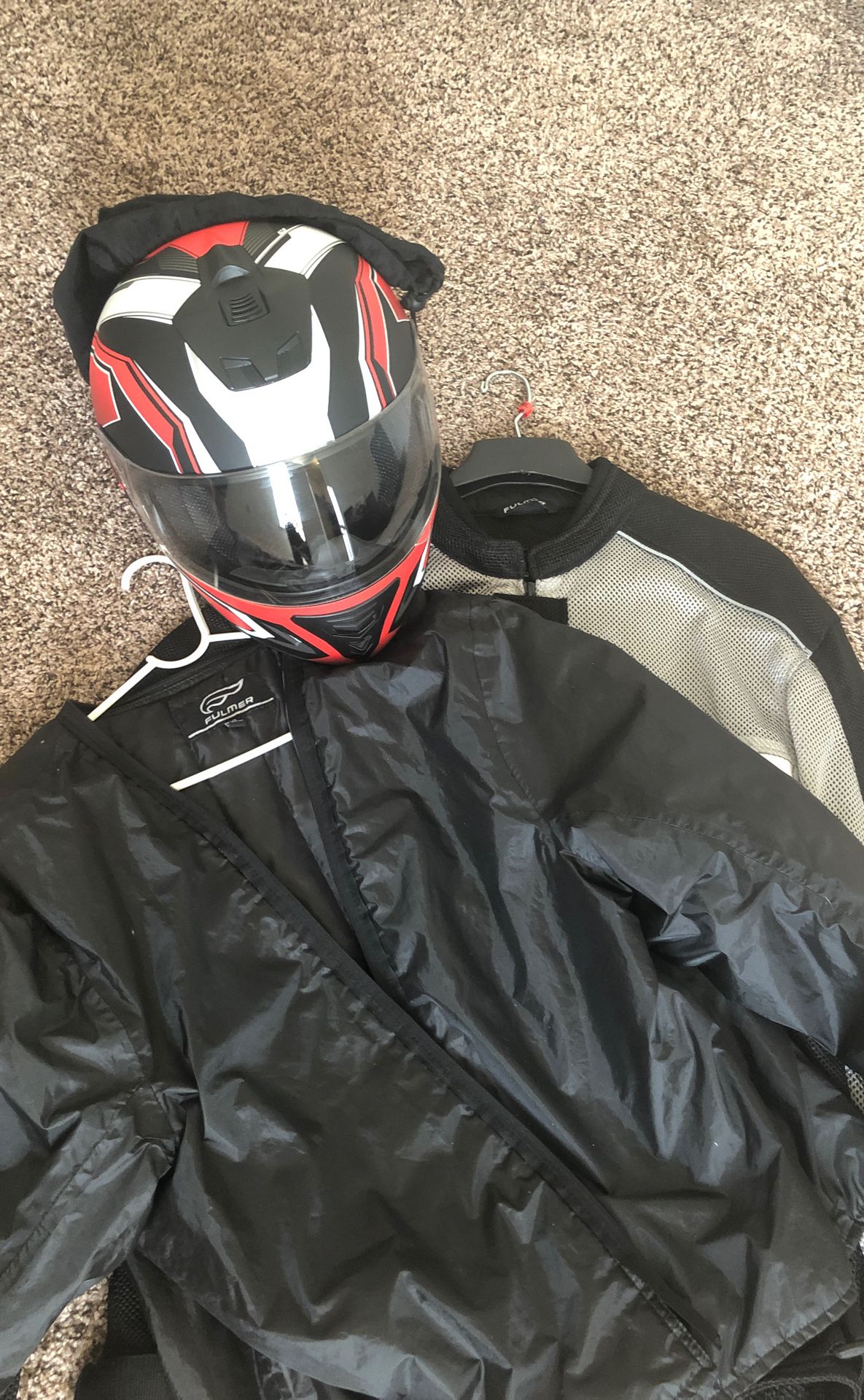 Photo Motorcycle jacket and helmet brand new never been worn!