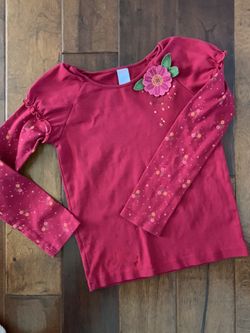 Never worn Gymboree size 9 super cute shirt has a look of two shirts in one.