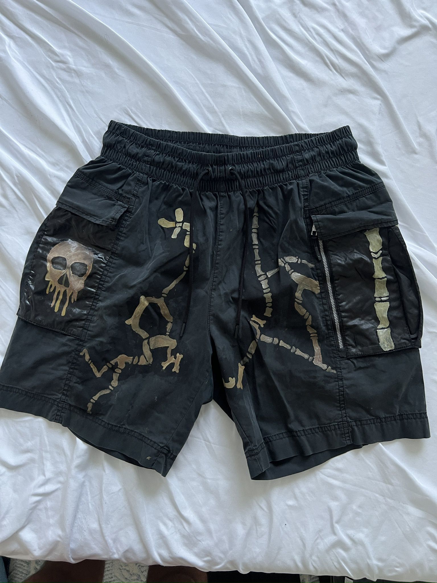 Vintage faded, black cargo shorts, Nike size large skulls