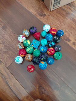 Random assortment of Bakugan (cards, Bakugan, magnetic tiles)