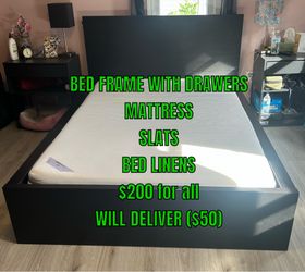 Full size IKEA bed frame and mattress with linens and storage drawers