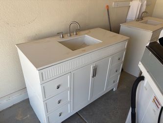 White Bathroom Vanity with Stone Top and Faucet