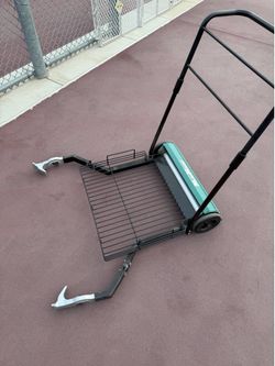 Selling a MultiMower tennis court roller and ball cart.