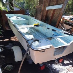 12' Fiberglass Boat, Trailer, And Trolling Motor. Both Have Titles.