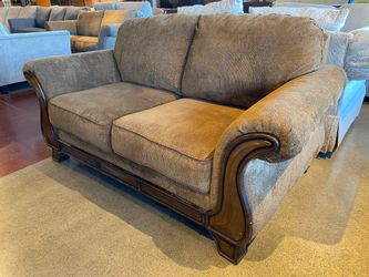 ASHLEY FURNITURE Montgomery Traditional Brown Loveseat with Flared Rolled Arms