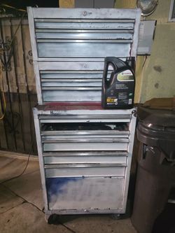 Old tool box with some stuff inside