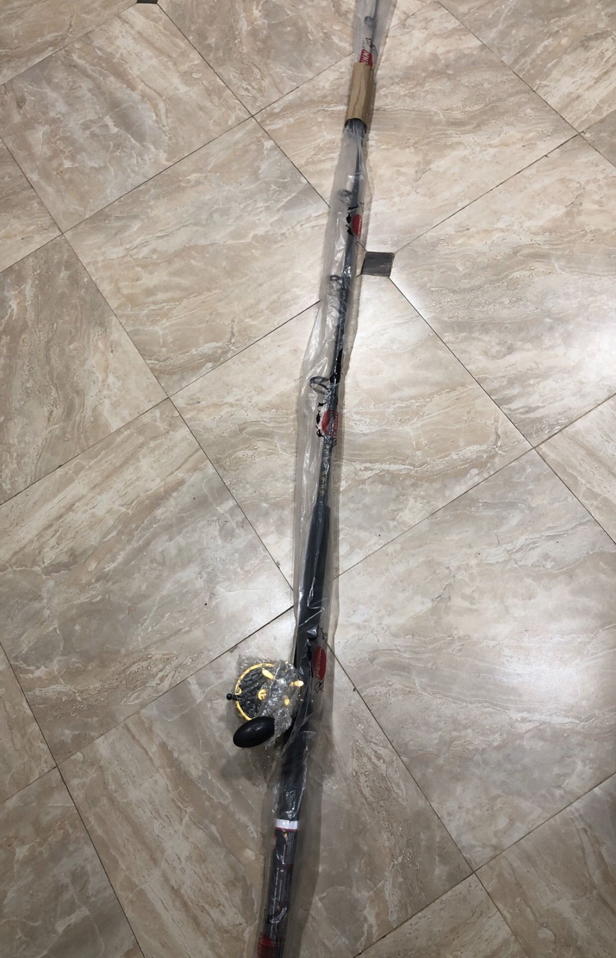 PENN SEA WATER FISHING COMPLETE REEL AND POLE BRAND NEW NEVER USED ITEM
