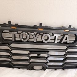Brand new Genuine OEM Toyota Tundra Grille and OEM Marker Lights