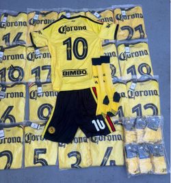 20 sets Club America home and away and Barcelona Soccer uniforms ready to pick up or i can ship them any where in the US 40$ each set includes jerseys