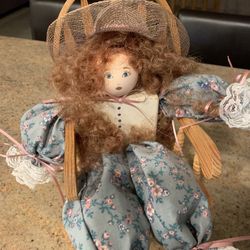 Doll In Rocking Chair 