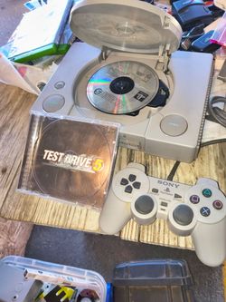 Sony PlayStation 1 Console with Controller and Game