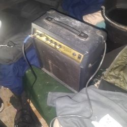 electric guitar with amp
