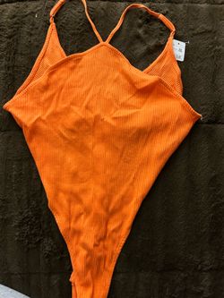 Orange bathing suit or bodysuit