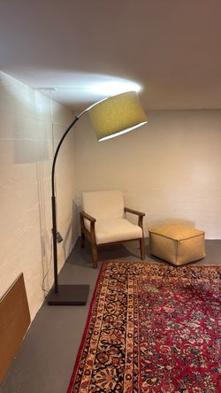 Bronze gray with tan shade arched floor lamp