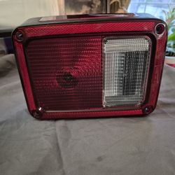  OEM rear driver or passenger Tail Light Jeep Wrangler  2007-2018 