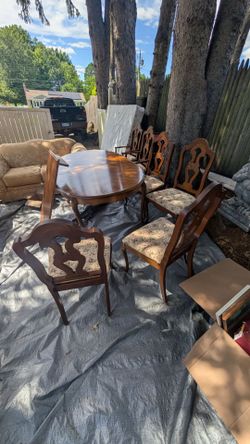 Dining room table with insert extension with six chairs