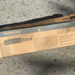 Performance Bike QuickStand (lightweight, non‑clamping, portable stand)