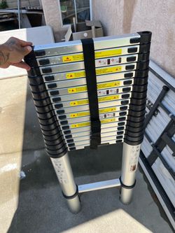 24 foot telescoping ladder (brand new)