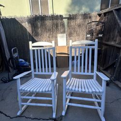 White rocking chairs
