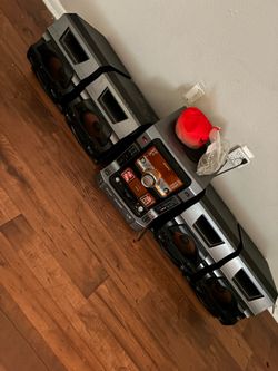 Sony mini hi-fi stereo system (a home audio system with multiple speakers and a central receiver/control unit).
