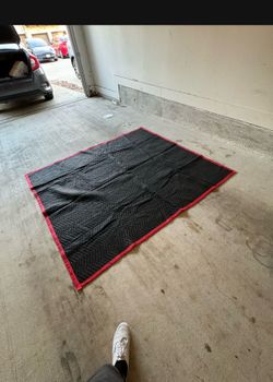 Seven large moving blankets