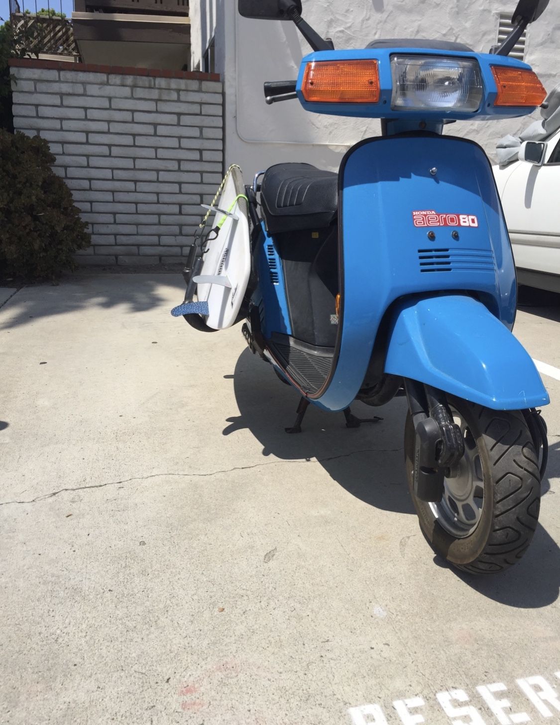 Honda aero 80 scooter with surf racks