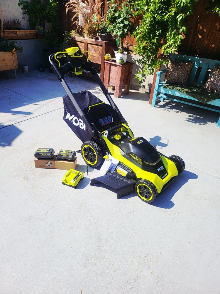 Ryobi 40V HP Brushless 21 in. Cordless Battery Walk Behind Self-Propelled Lawn Mower with (2) 4.0 Ah Batteries and Charger(open box never used))
