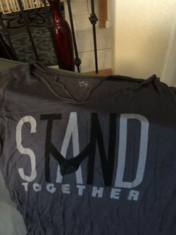 Dark gray brand new “Stand Together” shirt. Never been worn