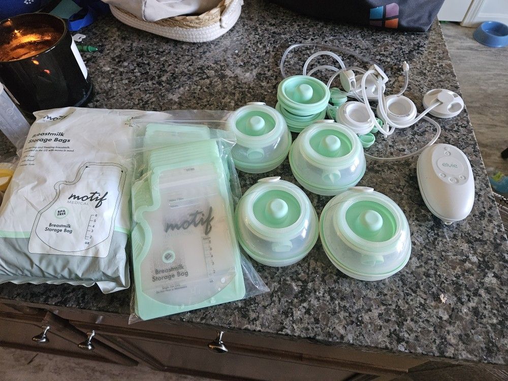 Like new Elvie Stride Pump With Extra Parts