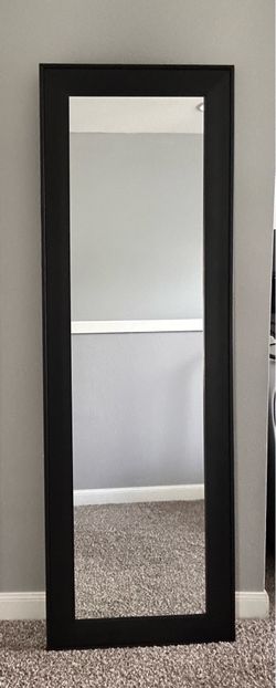 Black framed 5’x1.5’ mirror