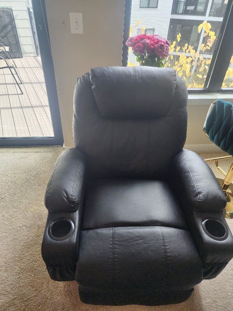 Black Leather Self Standing Recliner With Massager And Heat Option